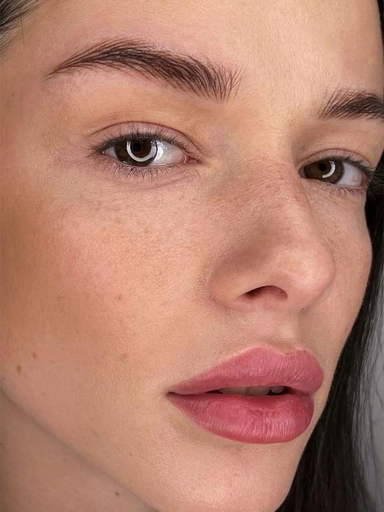 Young woman face close up
